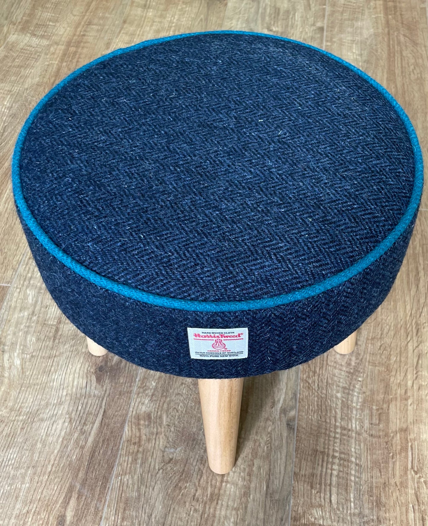 Navy Harris Tweed Footstool with Teal Piping and Varnished Wooden Legs