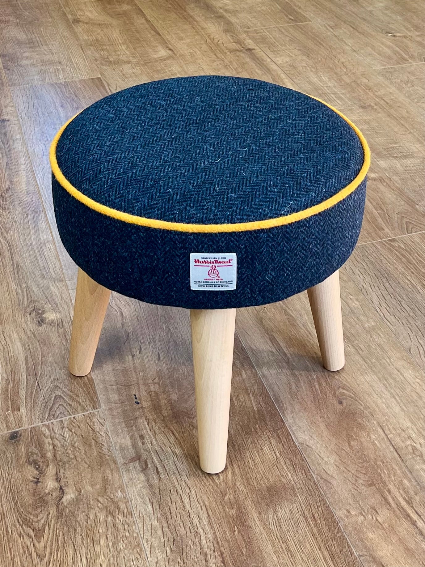 Navy Harris Tweed Footstool with Yellow Piping and Varnished Wooden Legs