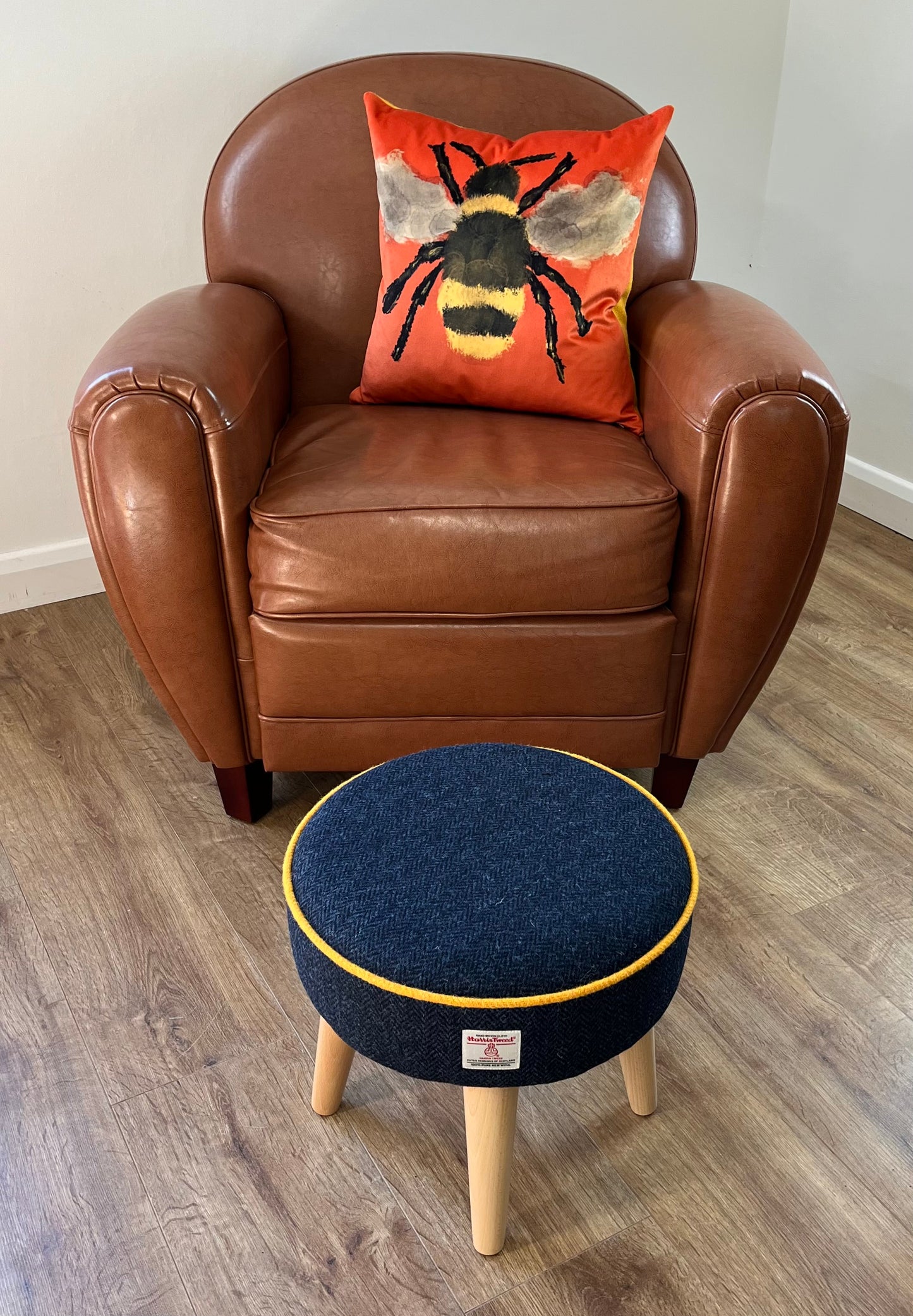 Navy Harris Tweed Footstool with Yellow Piping and Varnished Wooden Legs