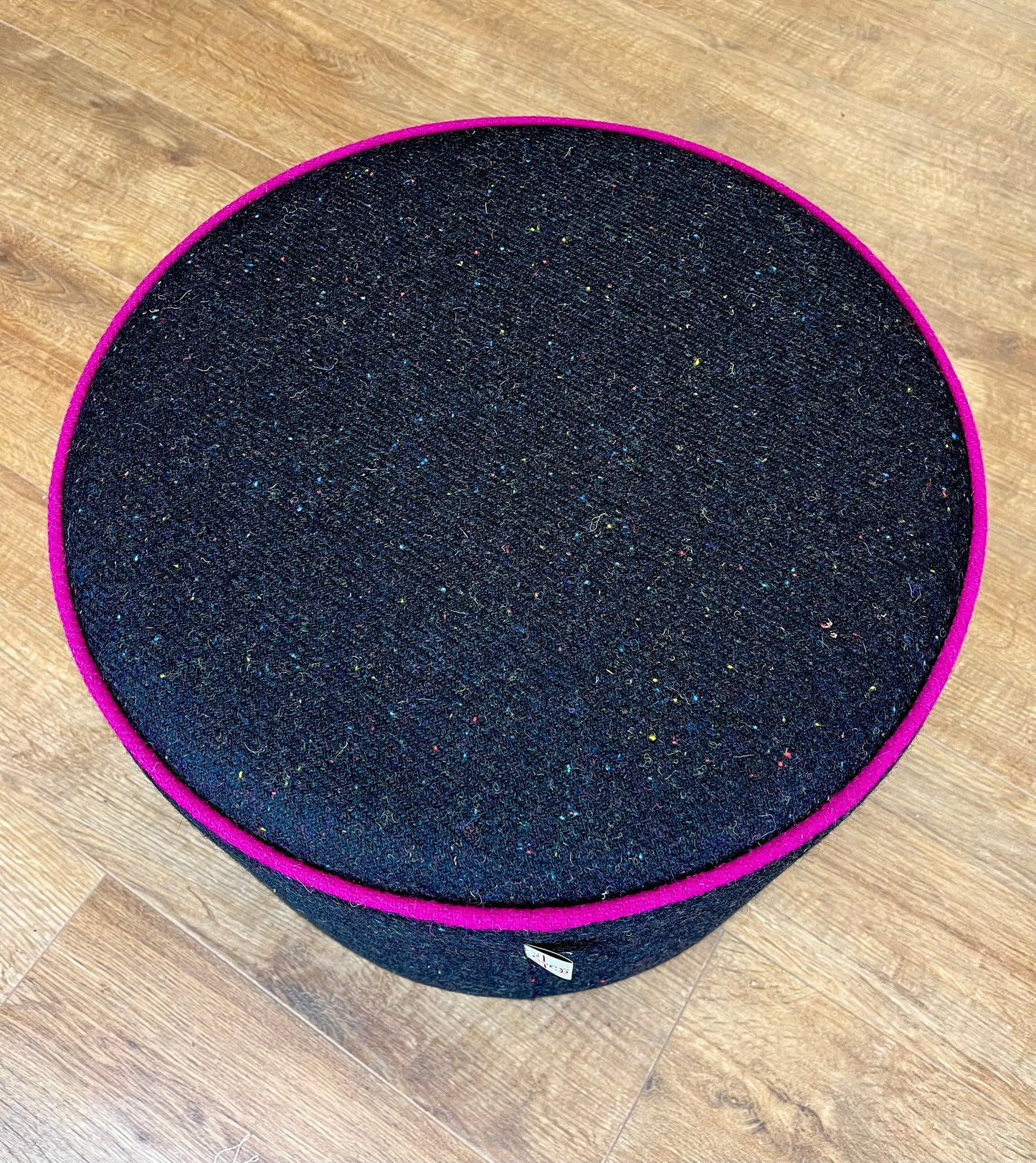 Black Speckled Harris Tweed Chunky Floating Footstool with Fuchsia Piping