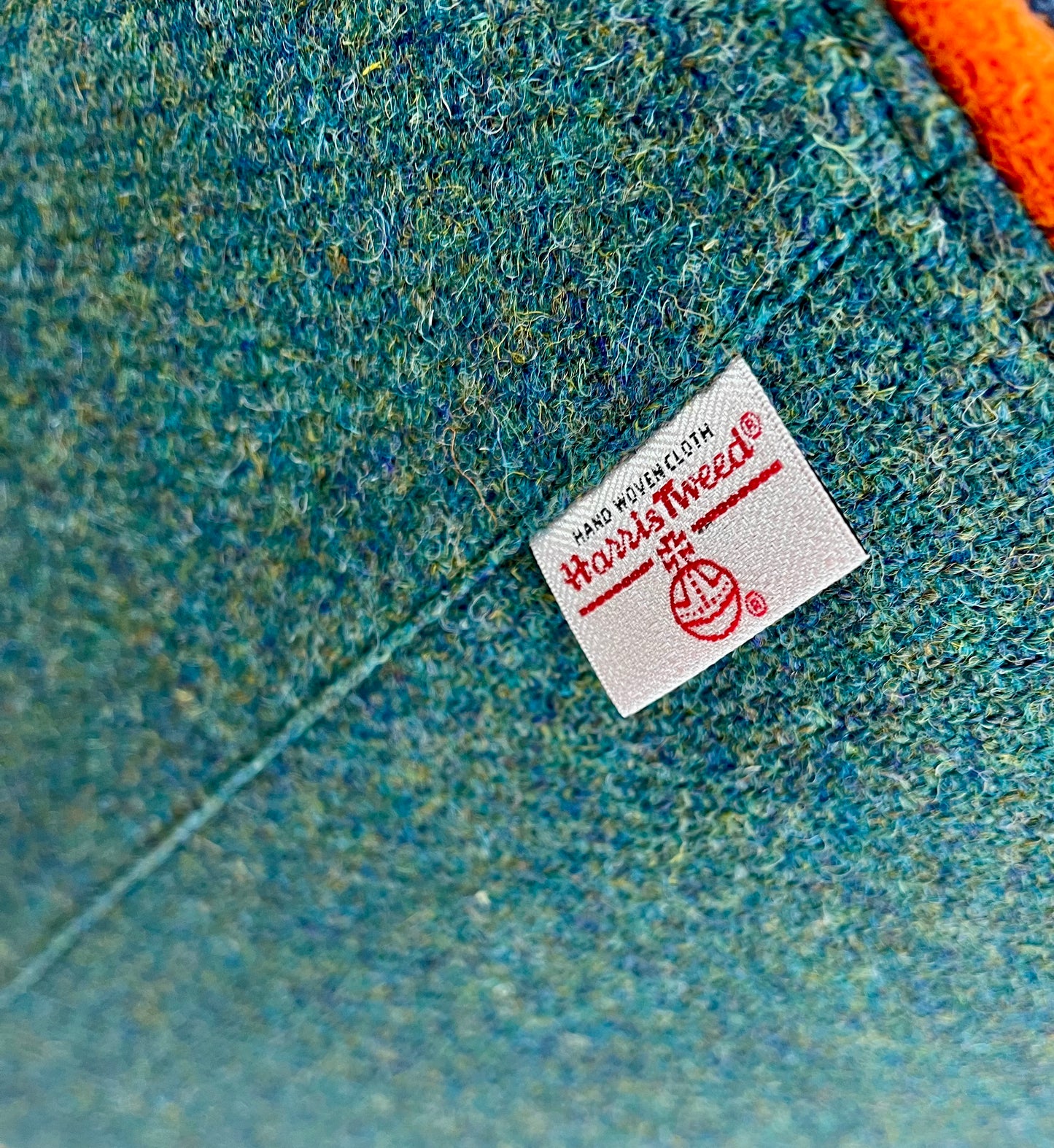 Green and Navy Harris Tweed Footstool with Orange Piping Detail