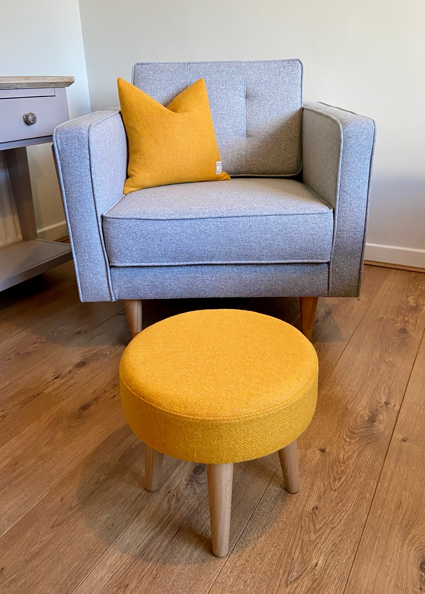Yellow Harris Tweed Footstool with Varnished Wooden Legs