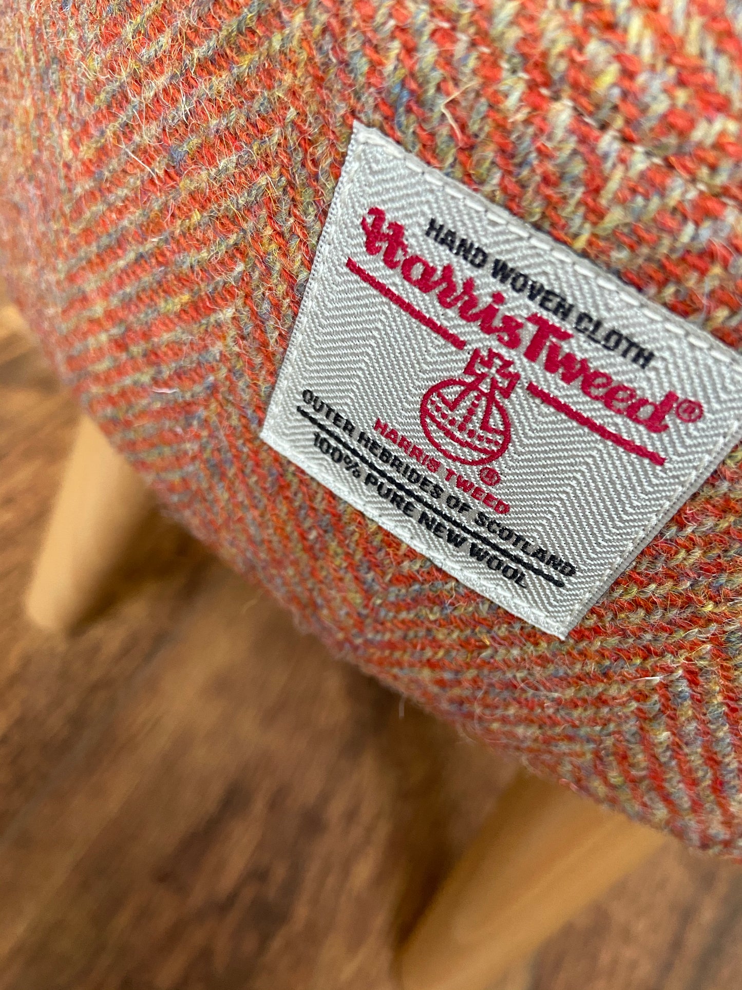 Burnt Orange Harris Tweed Footstool with Varnished Wooden Legs