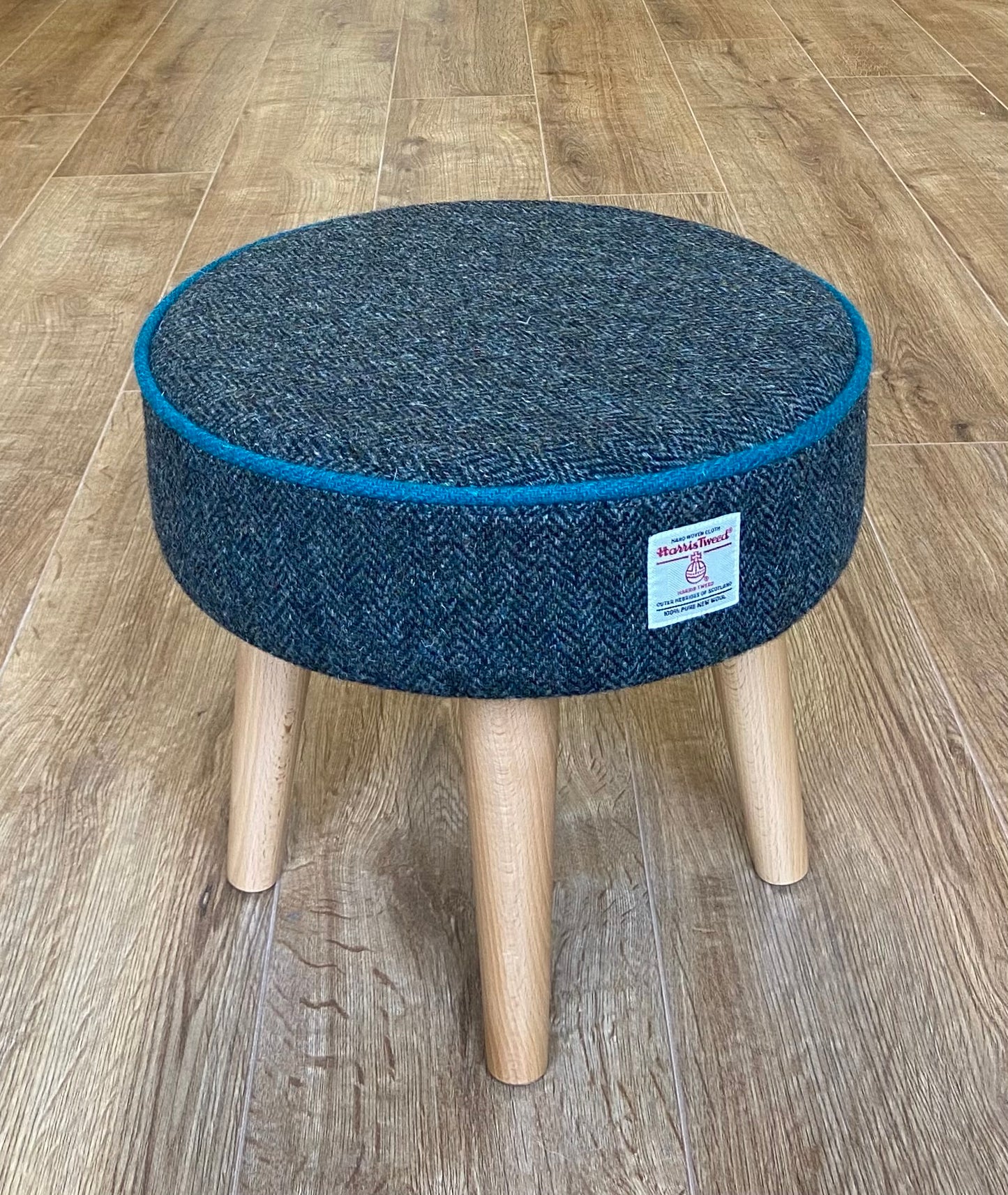 Charcoal Harris Tweed Footstool with Teal Piping and Varnished Wooden Legs
