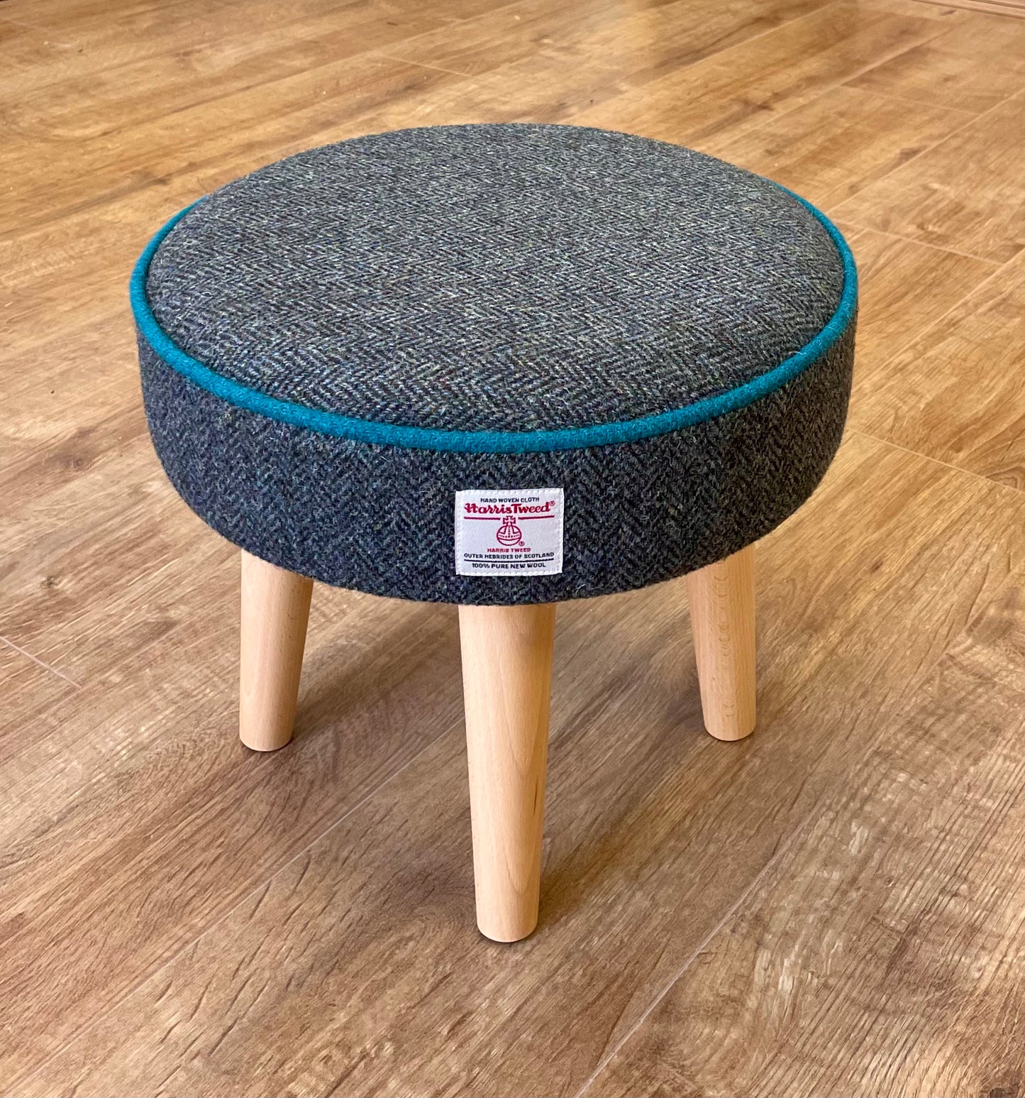 Charcoal Harris Tweed Footstool with Teal Piping and Varnished Wooden Legs